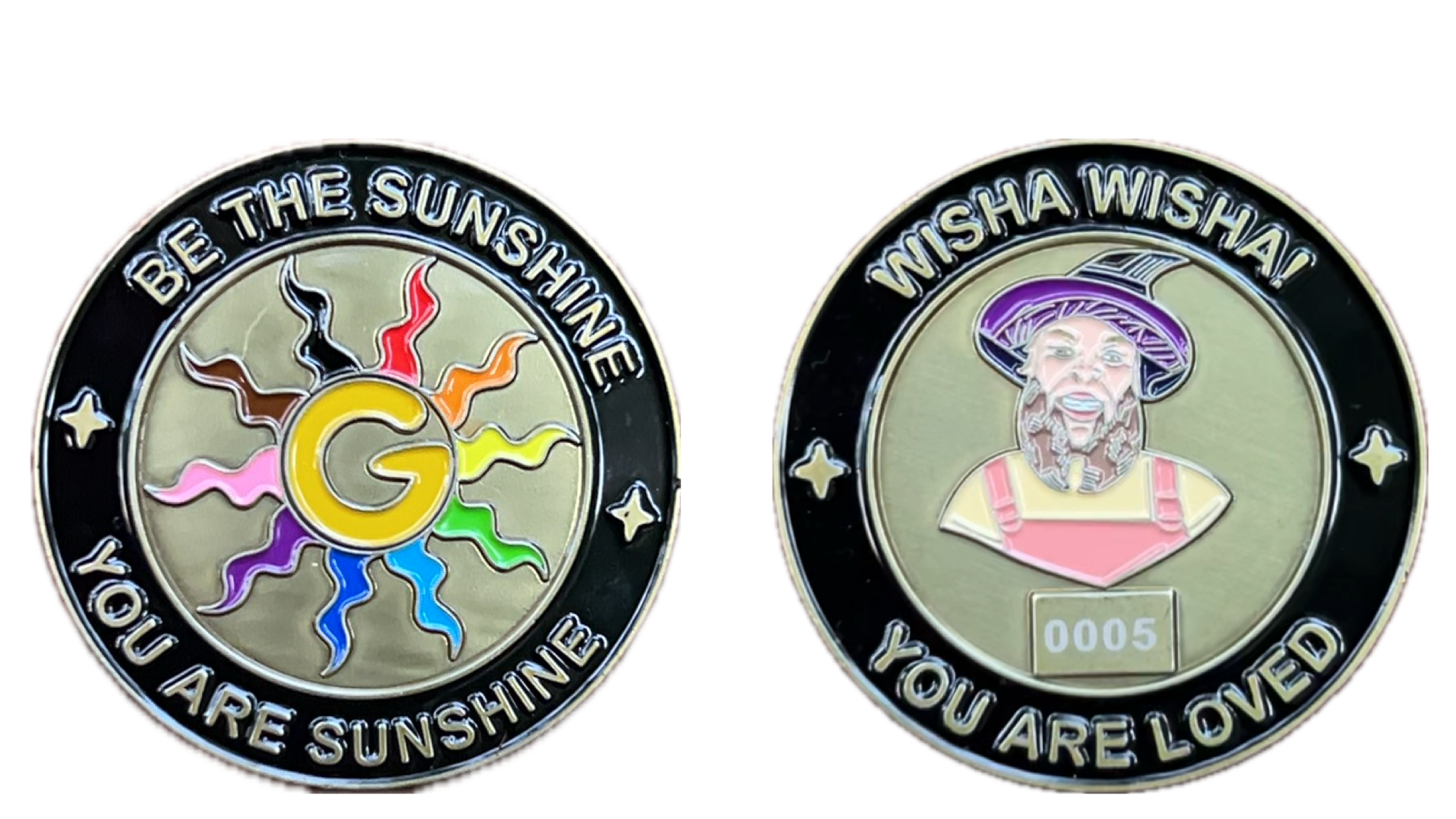 A photograph of the front and back of the metal wizard coin with soft enamel plating. 

This circular wizard coin has a recessed black ring around the edge with an antique gold colored thin line on either side of the black filled in ring. Inside the black ring on the top in arched gold colored text  are the words: 'BE THE SUNSHINE'. In the inner circle of this side of the coin is an uppercase letter G that is yellow like the sun. The sunny G has 10 brigthly colored squiggly sun rays around it. The squiggly sun ray colors include red, orange, yellow, green, blue, indigo, violet, pink, brown and black with a slightly embossed golden outline around it. There are also two gold sparkles in the recessed black ring that circles this side of the coin. They are positioned in the horizontal center of the outer circle in between the arched text on the top and the arched gold colored text on the bottom that reads “YOU ARE SUNSHINE”

The wizard coin is resting on a massive plush tomato that is wrapped like Saturn's rings around a massive plush burger bun. The wizard coin is crafted from soft enamel and has a 3D embossed and recessed type texture. The color of the wizard coin is similar to an antique gold hue. The size of the wizard coin is 1.75 inches in diameter. The coin weighs 1.1 ounces (32 grams)

photograph of WIZARD COIN side A:

In the center of the coin is an illustration of Gilly Shine (they/them). They are wearing a purple wizard hat, a yellow shirt and coral colored overalls. Curved around the top arch of the coin is the incantation 'WISHA WISHA!' and curved along the bottom of the coin is the affirmation: 'YOU ARE SUNSHINE'. Below the illustration is a a slightly raised rectangle box and a unique four digit sequential number is laser engraved inside the box. The number on this coin reads: 0005.

The wizard coin is resting on a massive plush tomato that is wrapped like Saturn's rings around a massive plush burger bun. The wizard coin is crafted from soft enamel and has a 3D embossed and recessed type texture. The color of the wizard coin is similar to an antique gold hue. The size of the wizard coin is 1.75 inches in diameter. The coin weighs 1.1 ounces (32 grams)